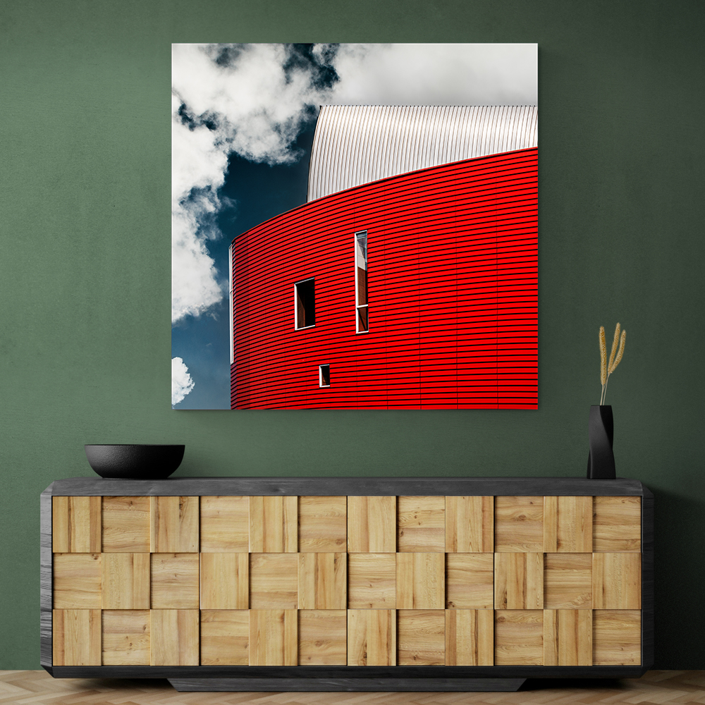 Three Tiny Windows In Red Wall