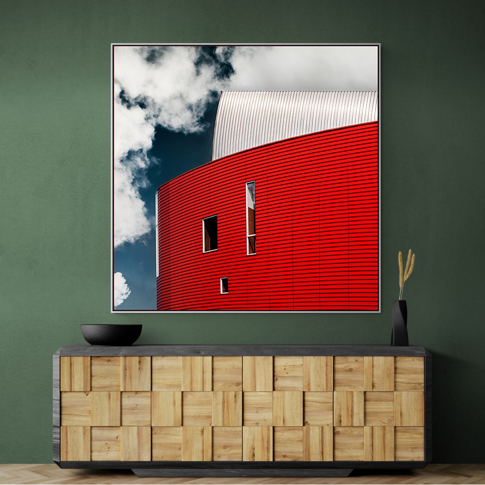 Three Tiny Windows In Red Wall