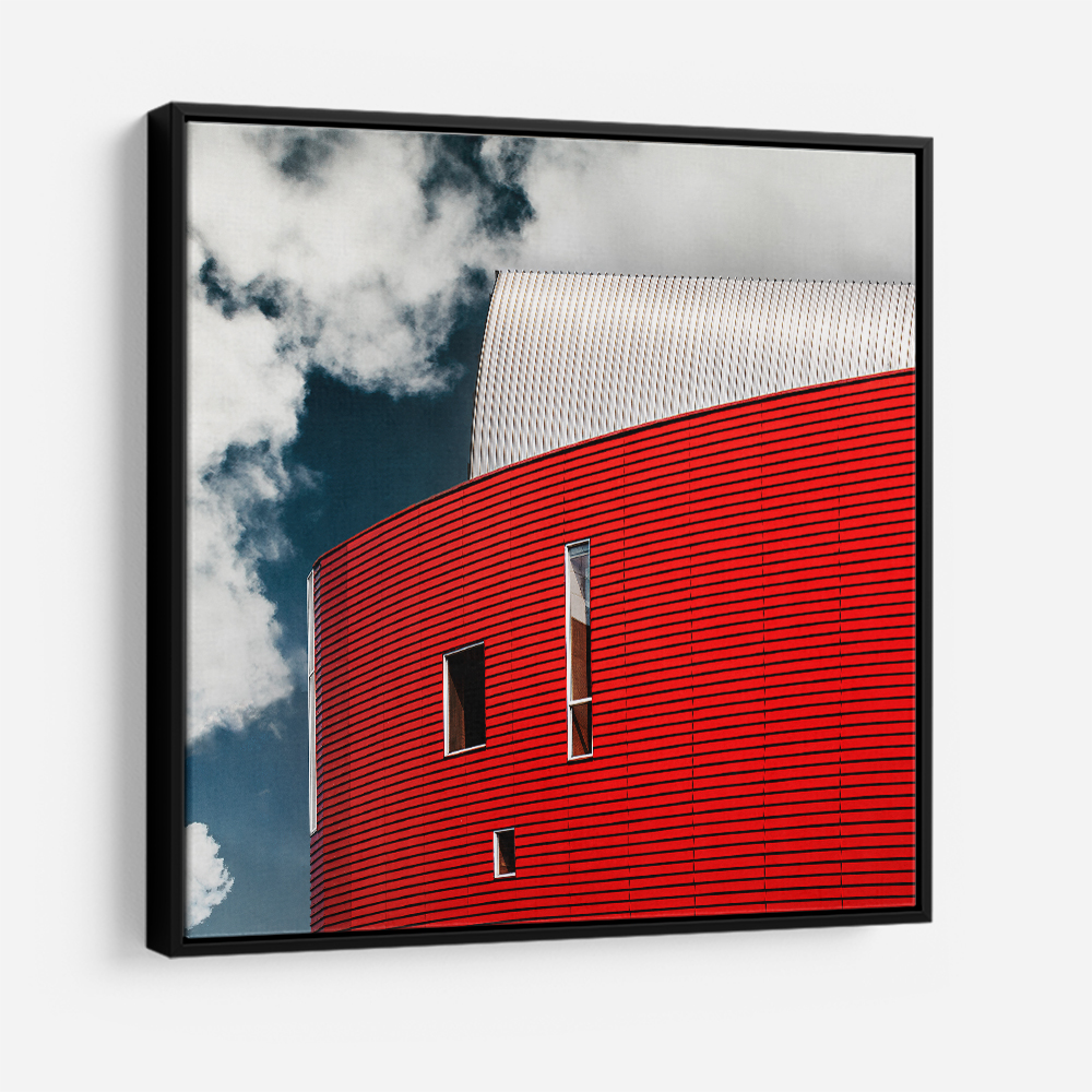 Three Tiny Windows In Red Wall