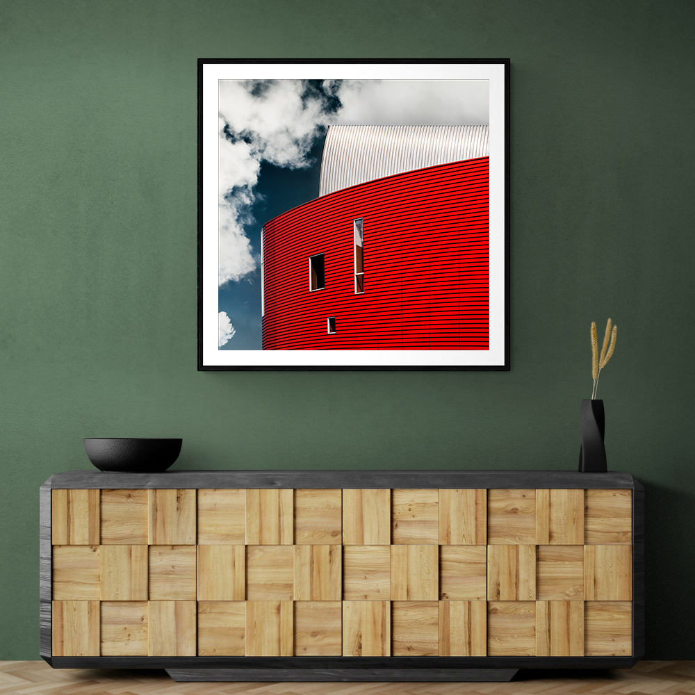 Three Tiny Windows In Red Wall